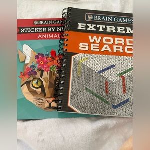Two books - extreme word search - sticker by number animals